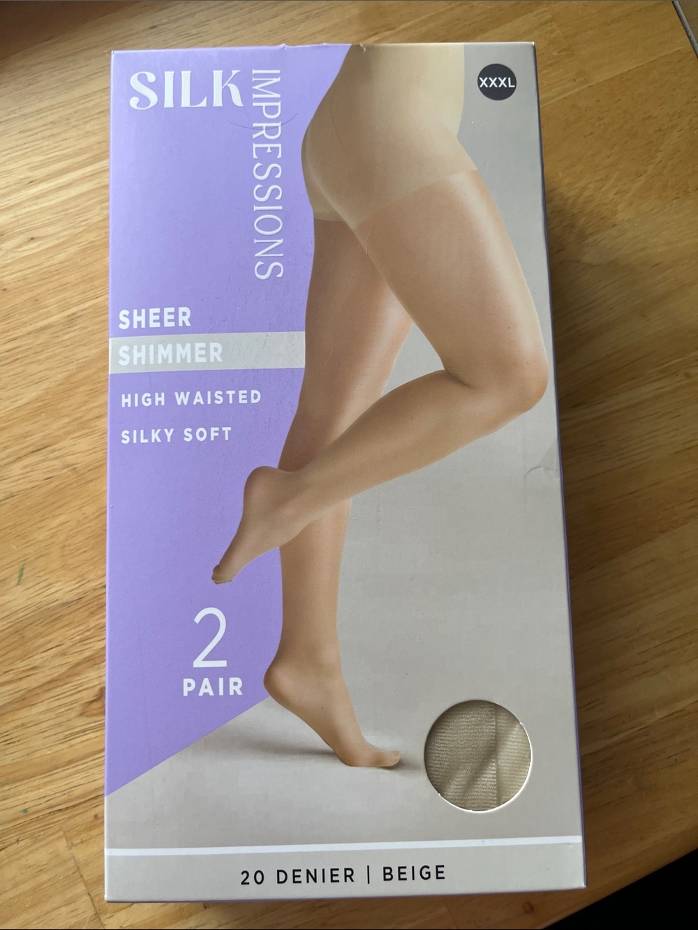 Silk Impressions shimmer Stockings 2 pairs per package.